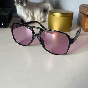 Purple framed sunglasses
